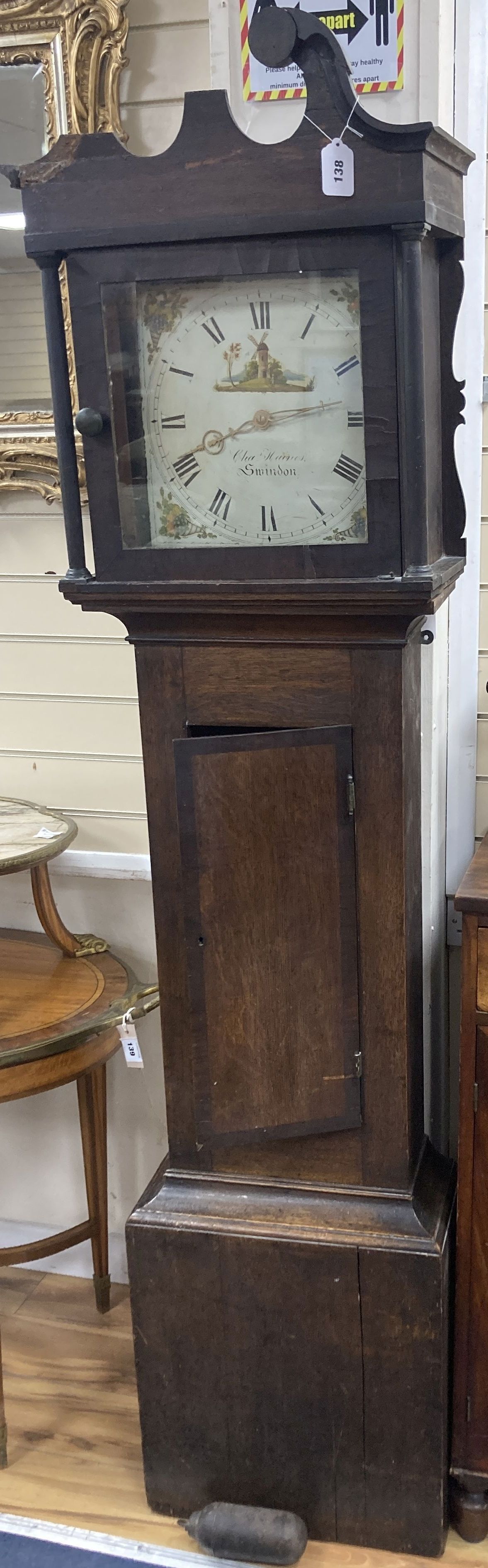 A small 19th century oak cased longcase clock (for restoration) 30 hour grandfather clock, the painted dial named Cha. Haines, Swindon,